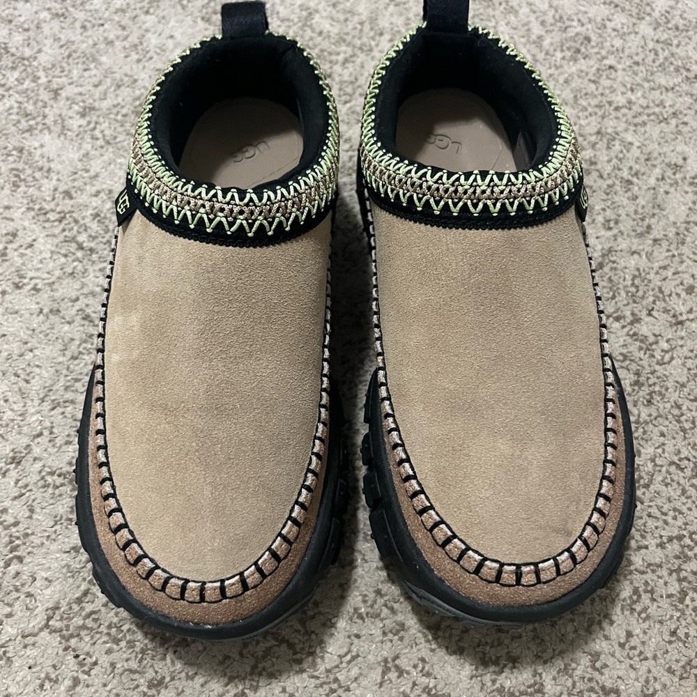 UGG Tan and Black Slip-On “Venture Daze” Loafers with Moccasin Style